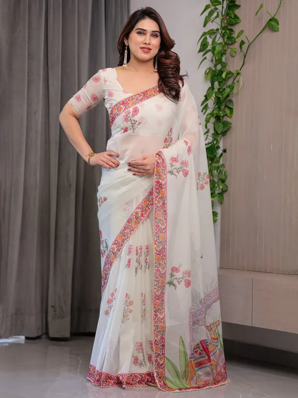 Ivory_White_Designer_Organza_Saree_with_Royal_Elephant_&_Camel_Motifs_|_Floral_Printed_Lightweight_Organza_Saree_with_Attached_Blouse_|_Festive_&_Ethnic_Wear_Saree