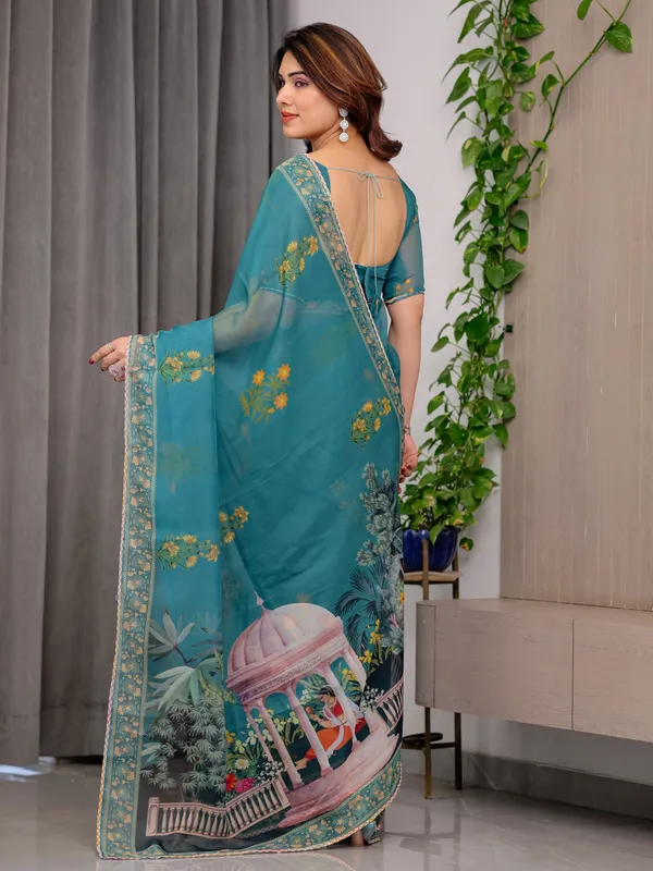 Teal_Green_Scenic_Printed_Organza_Saree_with_Garden_Pavilion_Artwork_Pallu_|_Designer_Lightweight_Organza_Saree_with_Floral_Motifs_&_Decorative_Border_|_Festive_&_Party_Wear_Saree_with_Blouse_Piece
