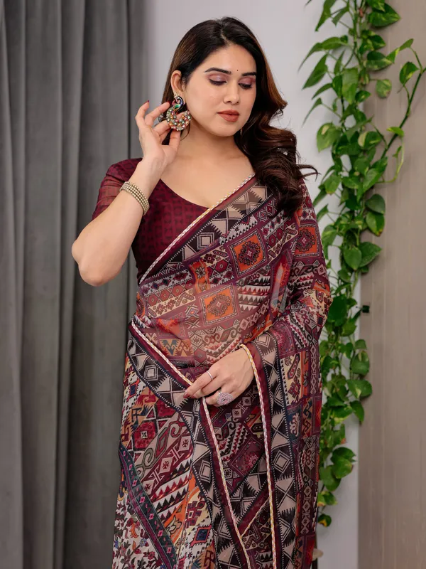 Maroon_Tribal_Geometric_Printed_Organza_Saree_with_Kalamkari_Inspired_Pallu_|_Designer_Ethnic_Patchwork_Style_Organza_Saree_with_Attached_Blouse_Piece_|_Festive_&_Party_Wear_Saree