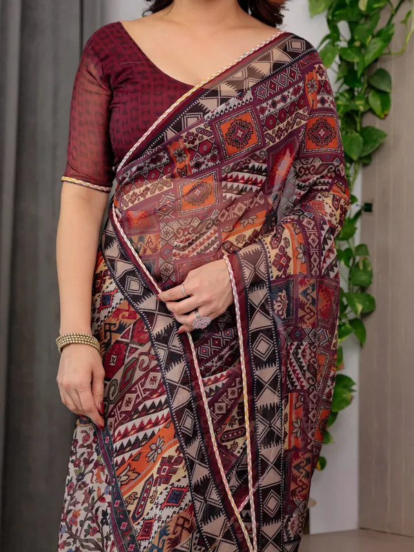 Maroon_Tribal_Geometric_Printed_Organza_Saree_with_Kalamkari_Inspired_Pallu_|_Designer_Ethnic_Patchwork_Style_Organza_Saree_with_Attached_Blouse_Piece_|_Festive_&_Party_Wear_Saree