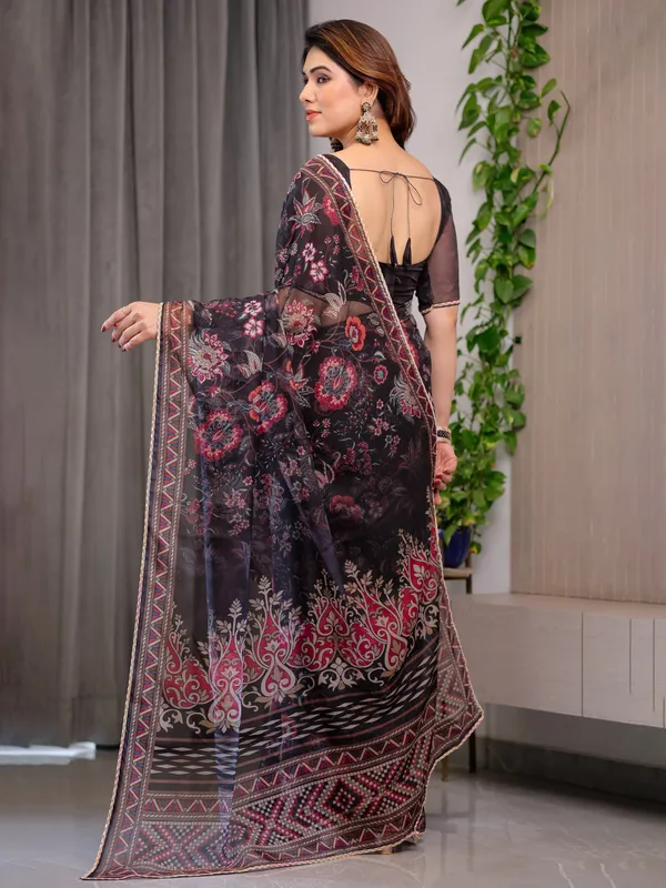 Black_Floral_Printed_Organza_Saree_with_Ethnic_Border_&_Ornamental_Pallu_|_Designer_Sheer_Organza_Saree_with_Traditional_Motifs_&_Blouse_Piece_|_Elegant_Festive_&_Party_Wear_Saree