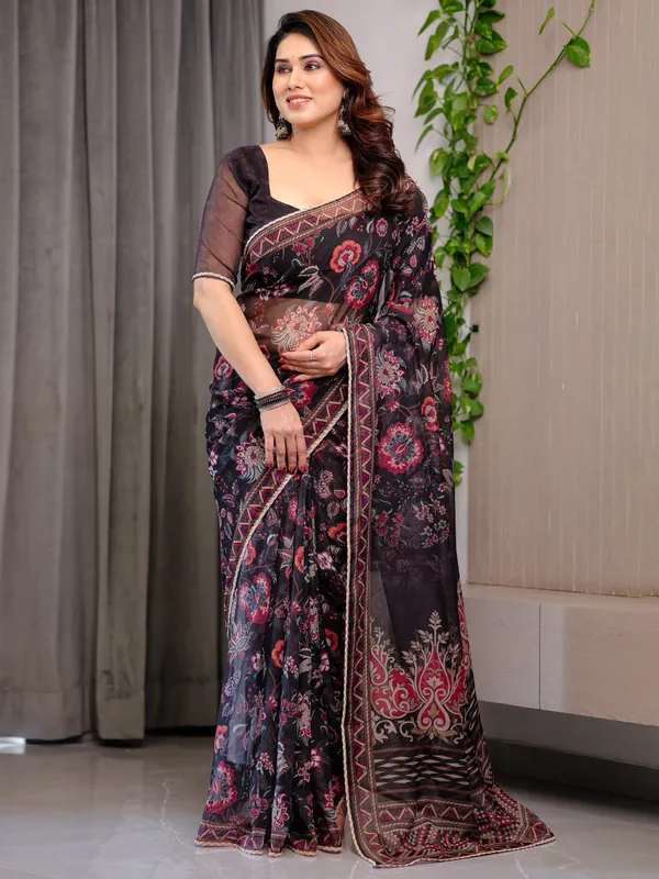 Black_Floral_Printed_Organza_Saree_with_Ethnic_Border_&_Ornamental_Pallu_|_Designer_Sheer_Organza_Saree_with_Traditional_Motifs_&_Blouse_Piece_|_Elegant_Festive_&_Party_Wear_Saree