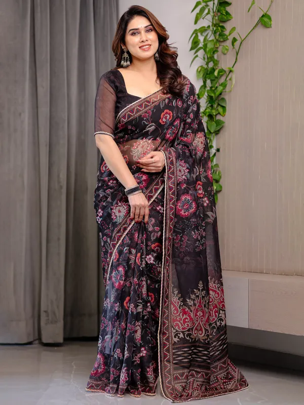 Black_Floral_Printed_Organza_Saree_with_Ethnic_Border_&_Ornamental_Pallu_|_Designer_Sheer_Organza_Saree_with_Traditional_Motifs_&_Blouse_Piece_|_Elegant_Festive_&_Party_Wear_Saree