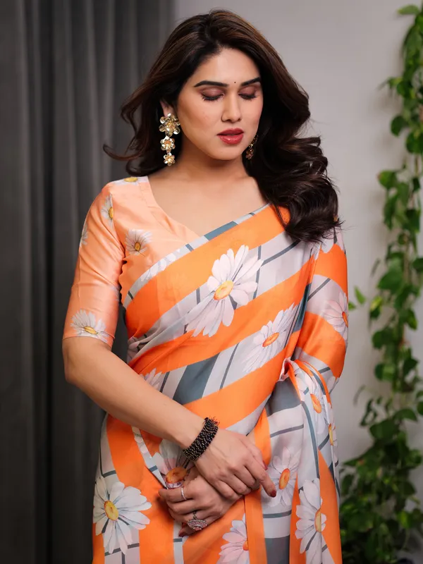 Orange_Satin_Georgette_Floral_Printed_Saree_with_Attached_Blouse_–_Lightweight_Daisy_Print_Designer_Saree_for_Festive_&_Casual_Elegance