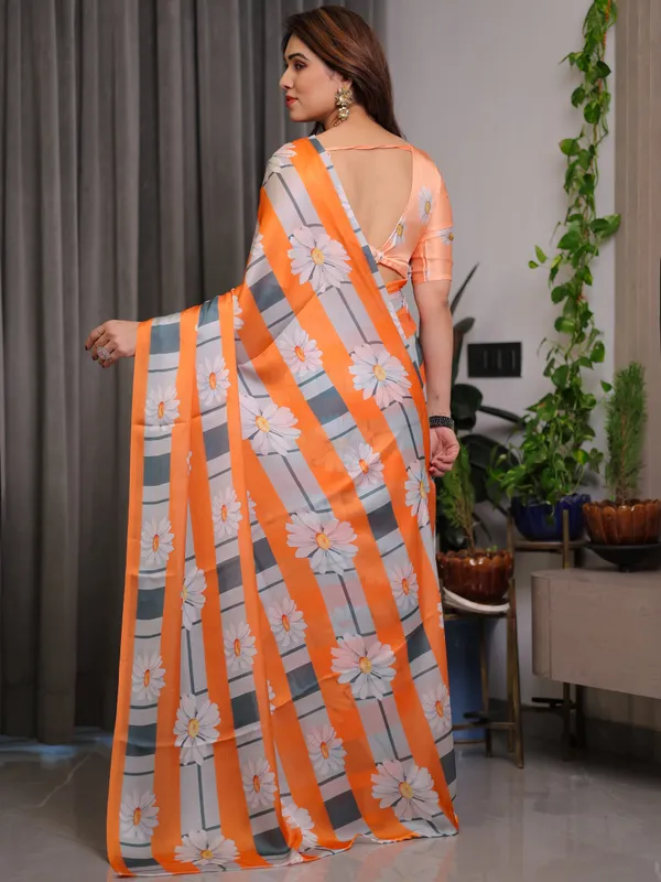 Orange_Satin_Georgette_Floral_Printed_Saree_with_Attached_Blouse_–_Lightweight_Daisy_Print_Designer_Saree_for_Festive_&_Casual_Elegance