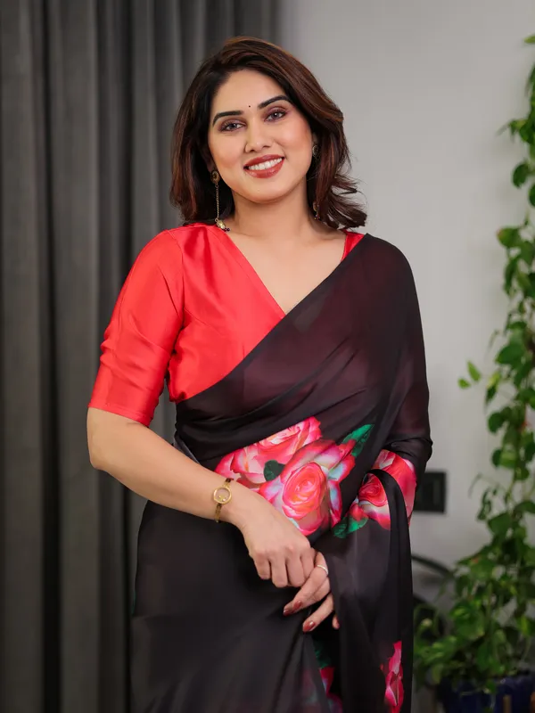 Black_Satin_Georgette_Rose_Printed_Saree_with_Attached_Blouse_–_Elegant_Partywear_Designer_Saree_with_Red_Floral_Artwork
