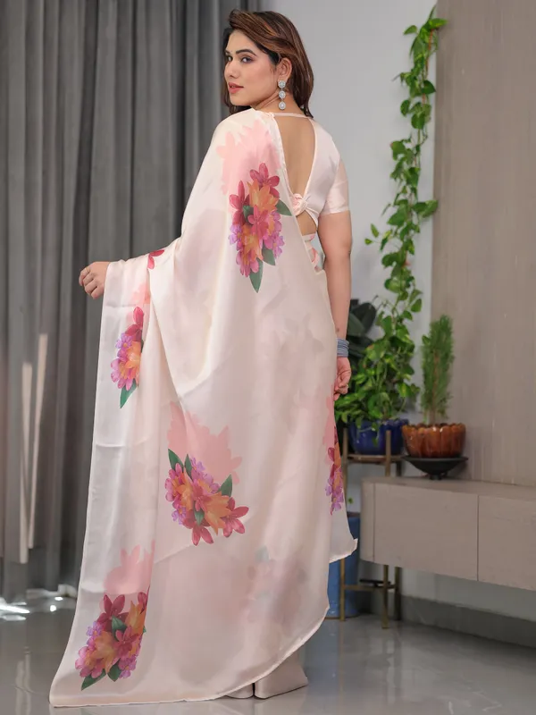 Blush_Peach_Satin_Georgette_Floral_Printed_Saree_with_Attached_Blouse_–_Soft_Pastel_Designer_Saree_for_Elegant_&_Festive_Wear
