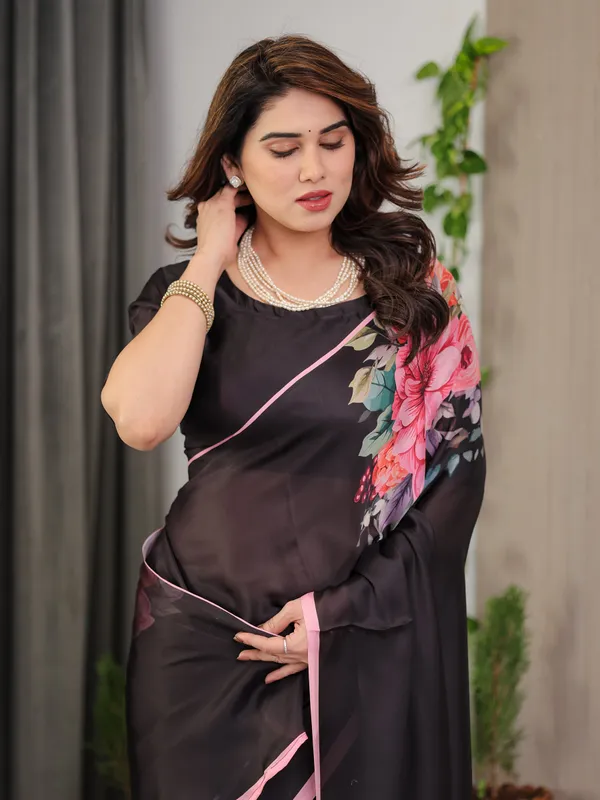 Black_Satin_Georgette_Floral_Printed_Saree_with_Soft_Pink_Border_&_Attached_Blouse_–_Elegant_Designer_Partywear_Drape