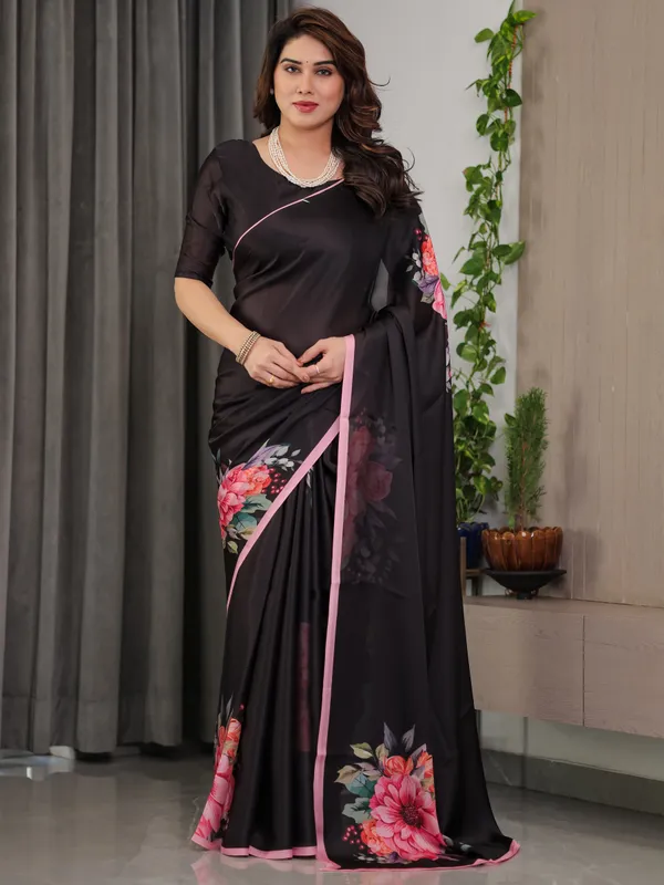 Black_Satin_Georgette_Floral_Printed_Saree_with_Soft_Pink_Border_&_Attached_Blouse_–_Elegant_Designer_Partywear_Drape