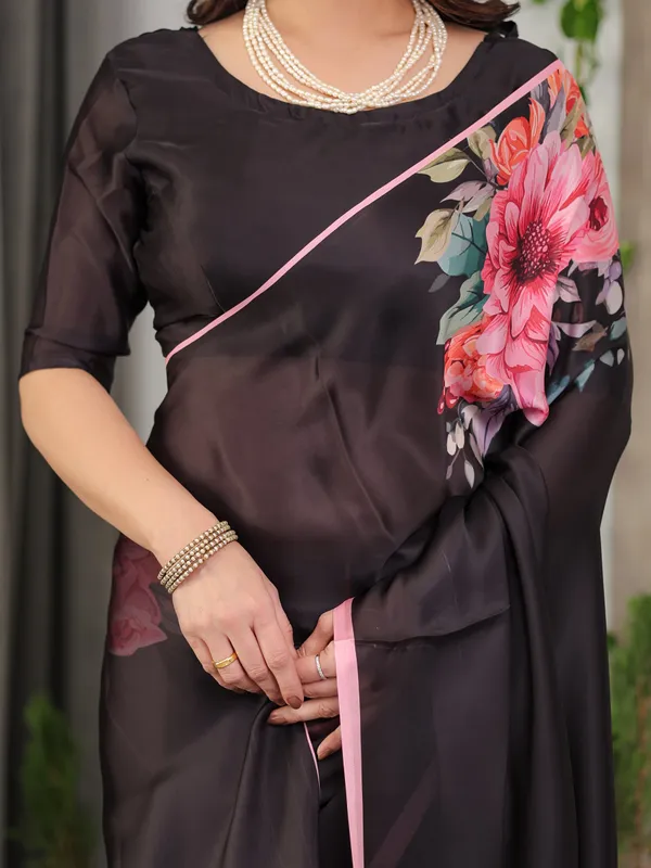 Black_Satin_Georgette_Floral_Printed_Saree_with_Soft_Pink_Border_&_Attached_Blouse_–_Elegant_Designer_Partywear_Drape