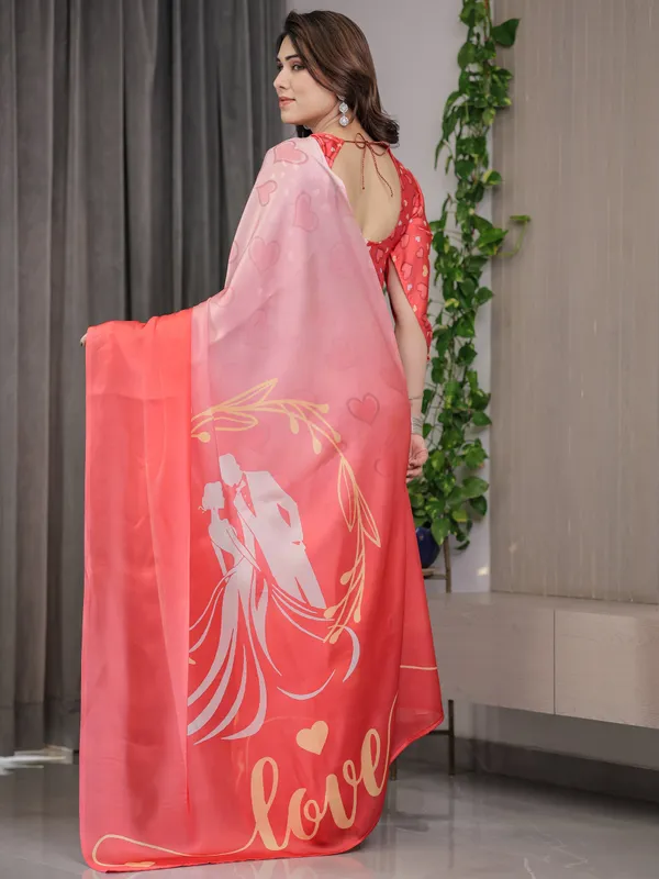 Coral_Red_&_Blush_Pink_Heart_Printed_Satin_Georgette_Saree_with_Romantic_Couple_Pallu_and_Attached_Heart_Print_Blouse_–_5.5_Meter_Designer_Saree_for_Valentine’s_Day_&_Anniversary_Wear