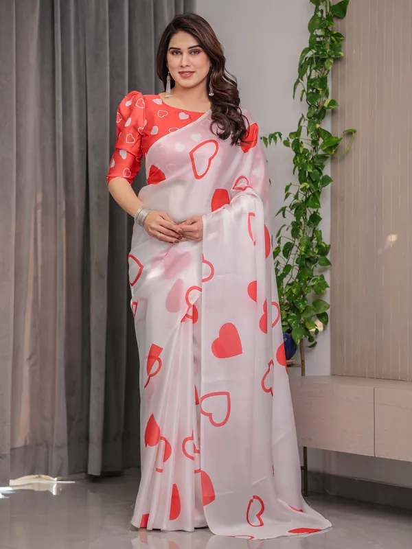 Ivory_White_Satin_Georgette_Saree_with_Bold_Red_Heart_Print_and_Attached_Red_Heart_Pattern_Blouse_–_5.5_Meter_Romantic_Designer_Saree_for_Valentine’s_Day_&_Anniversary_Wear