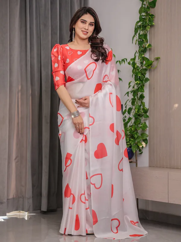 Ivory_White_Satin_Georgette_Saree_with_Bold_Red_Heart_Print_and_Attached_Red_Heart_Pattern_Blouse_–_5.5_Meter_Romantic_Designer_Saree_for_Valentine’s_Day_&_Anniversary_Wear
