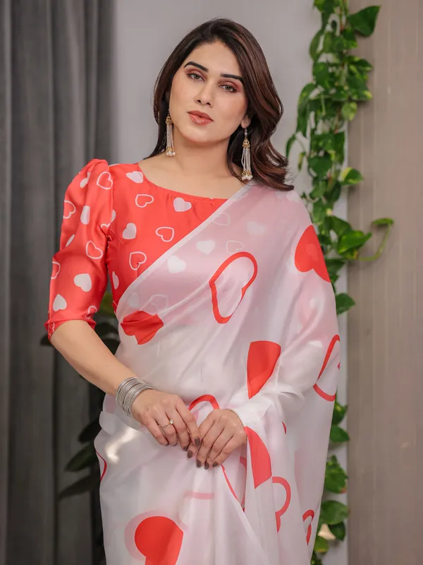 Ivory_White_Satin_Georgette_Saree_with_Bold_Red_Heart_Print_and_Attached_Red_Heart_Pattern_Blouse_–_5.5_Meter_Romantic_Designer_Saree_for_Valentine’s_Day_&_Anniversary_Wear