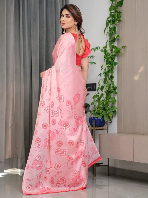 Soft_Baby_Pink_Satin_Georgette_Saree_with_Love_Letter_&_Stamp_Motif_Print_and_Attached_Coral_Red_Plain_Blouse_–_5.5_Meter_Romantic_Designer_Saree_for_Valentine’s_Day_&_Anniversary_Wear