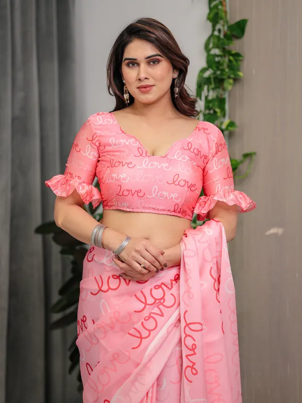 Blush_Pink_Satin_Georgette_Saree_with_All-Over_Love_Typography_Print_and_Attached_Matching_Printed_Blouse_–_5.5_Meter_Romantic_Designer_Saree_for_Valentine’s_Day_&_Anniversary_Wear