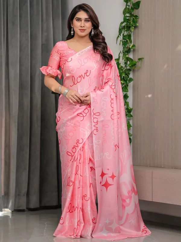 Blush_Pink_Satin_Georgette_Saree_with_All-Over_Love_Typography_Print_and_Attached_Matching_Printed_Blouse_–_5.5_Meter_Romantic_Designer_Saree_for_Valentine’s_Day_&_Anniversary_Wear
