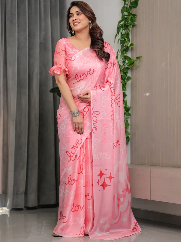 Blush_Pink_Satin_Georgette_Saree_with_All-Over_Love_Typography_Print_and_Attached_Matching_Printed_Blouse_–_5.5_Meter_Romantic_Designer_Saree_for_Valentine’s_Day_&_Anniversary_Wear