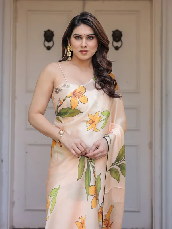 Champagne_Peach_Satin_Georgette_Floral_Printed_Saree_with_Matching_Printed_Blouse_&_Statement_Botanical_Pallu_|_Elegant_Soft_Party_Wear_Saree