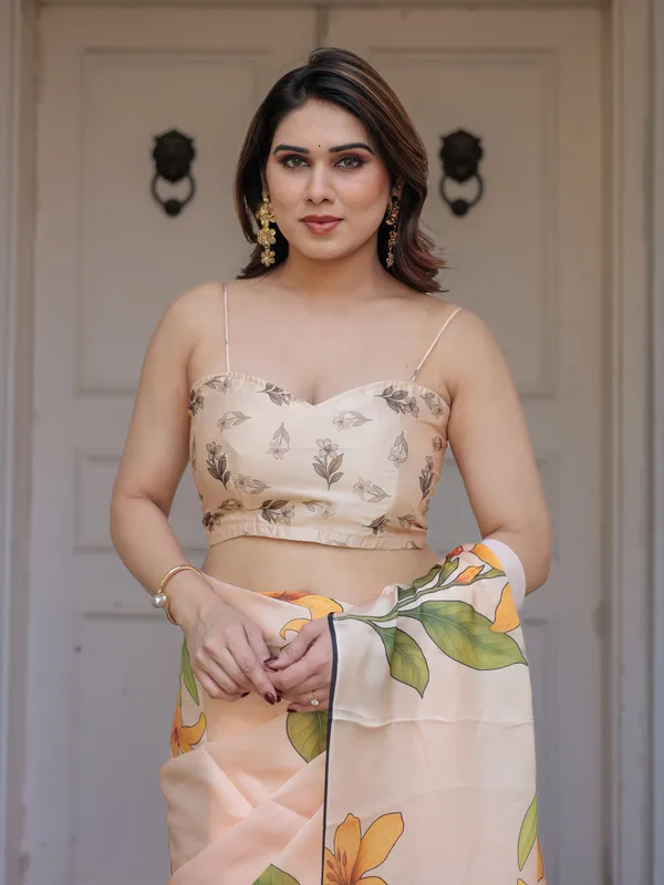 Champagne_Peach_Satin_Georgette_Floral_Printed_Saree_with_Matching_Printed_Blouse_&_Statement_Botanical_Pallu_|_Elegant_Soft_Party_Wear_Saree