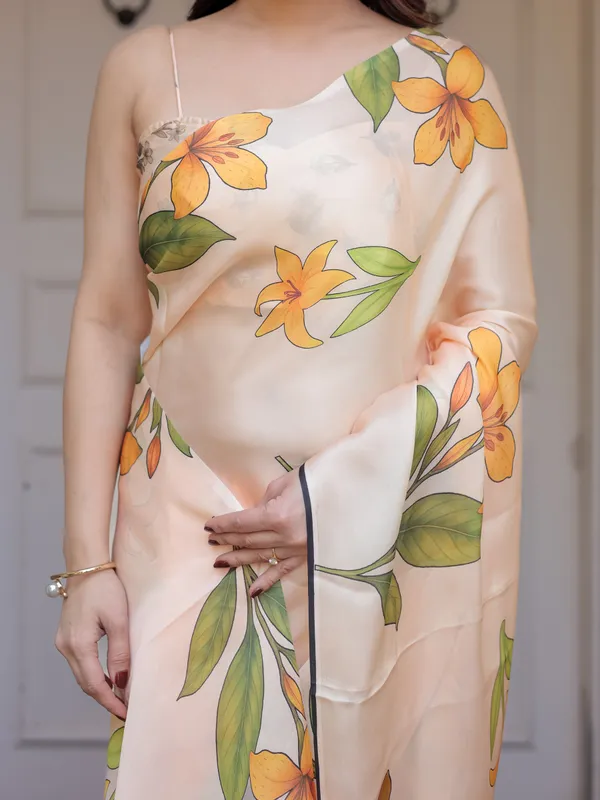 Champagne_Peach_Satin_Georgette_Floral_Printed_Saree_with_Matching_Printed_Blouse_&_Statement_Botanical_Pallu_|_Elegant_Soft_Party_Wear_Saree