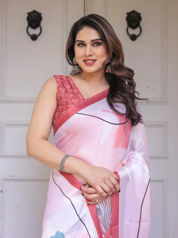 Pastel_Pink_Abstract_Floral_Printed_Satin_Georgette_Saree_with_Contrast_Coral_Border_&_Matching_Blouse_–_Modern_Elegant_Wear