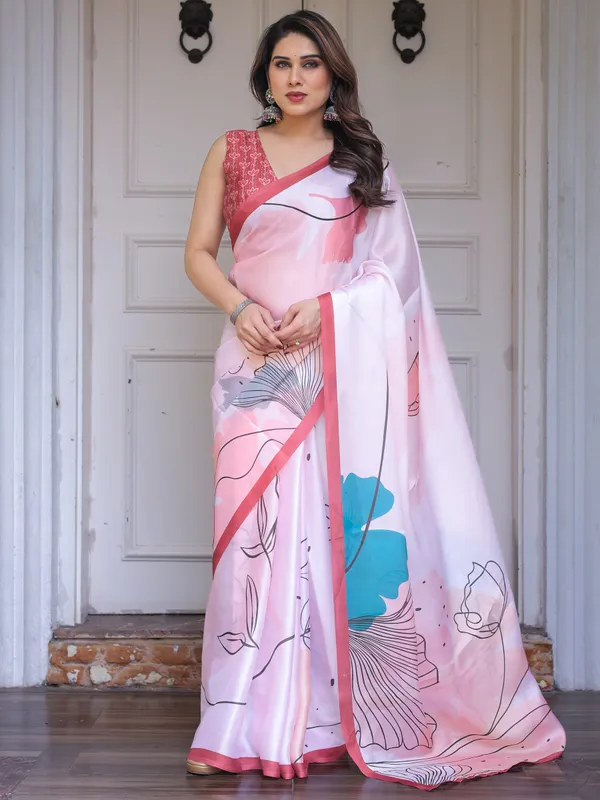 Pastel_Pink_Abstract_Floral_Printed_Satin_Georgette_Saree_with_Contrast_Coral_Border_&_Matching_Blouse_–_Modern_Elegant_Wear