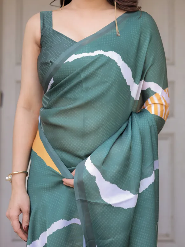 Bottle_Green_Abstract_Printed_Satin_Georgette_Saree_with_Designer_Border_&_Unstitched_Blouse_–_Modern_Party_&_Office_Wear