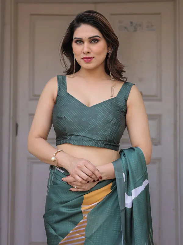 Bottle_Green_Abstract_Printed_Satin_Georgette_Saree_with_Designer_Border_&_Unstitched_Blouse_–_Modern_Party_&_Office_Wear