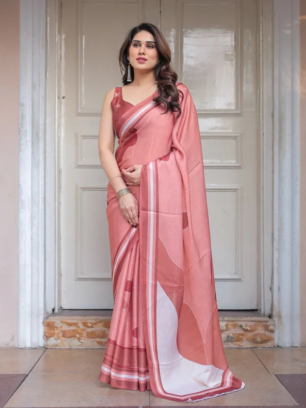 Coral_Peach_Minimal_Floral_Satin_Georgette_Saree_with_Soft_Border_&_Unstitched_Blouse_–_Elegant_Day_&_Occasion_Wear