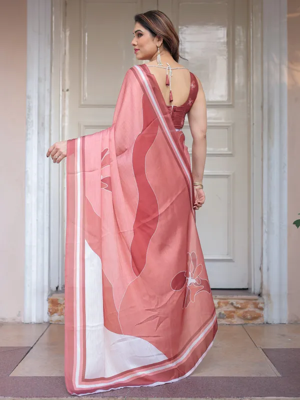 Coral_Peach_Minimal_Floral_Satin_Georgette_Saree_with_Soft_Border_&_Unstitched_Blouse_–_Elegant_Day_&_Occasion_Wear
