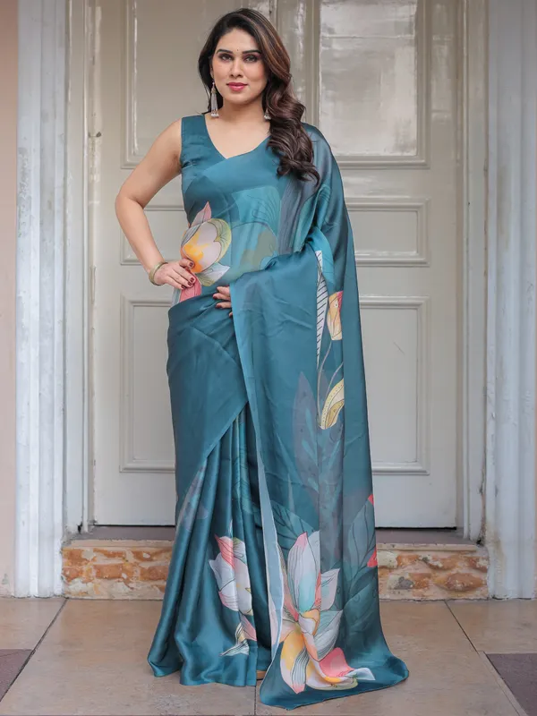 Teal_Blue_Large_Floral_Printed_Satin_Georgette_Saree_with_Artistic_Pallu_&_Unstitched_Blouse_–_Elegant_Party_&_Occasion_Wear
