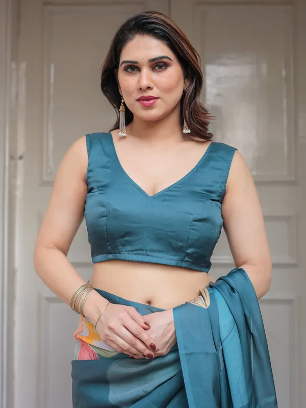 Teal_Blue_Large_Floral_Printed_Satin_Georgette_Saree_with_Artistic_Pallu_&_Unstitched_Blouse_–_Elegant_Party_&_Occasion_Wear