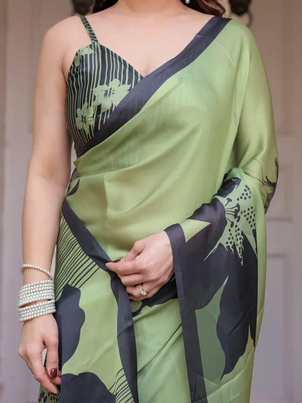Olive_Green_&_Black_Artistic_Floral_Printed_Satin_Georgette_Saree_with_Matching_Blouse_–_Elegant_Party_&_Festive_Wear