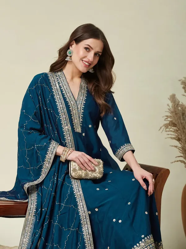 Violet,_green_and_gold-toned_embroidered_kurta_with_trousers_and_dupatta