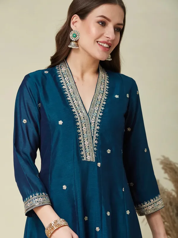 Violet,_green_and_gold-toned_embroidered_kurta_with_trousers_and_dupatta