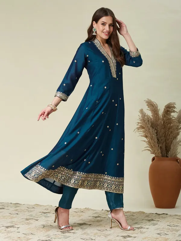 Violet,_green_and_gold-toned_embroidered_kurta_with_trousers_and_dupatta