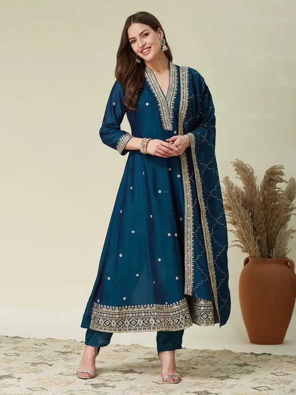 Violet,_green_and_gold-toned_embroidered_kurta_with_trousers_and_dupatta
