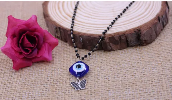 Black_Beaded_Blue_Evil_Eye_Butterfly_Pendant_Mangalsutra_For_Women