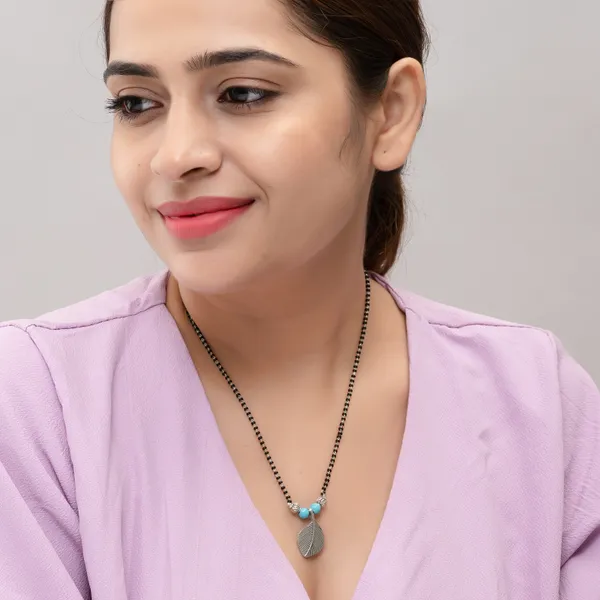 Black_Beaded_Silver_Toned_Leaf_Turquoise_Pendant_Mangalsutra_For_Women