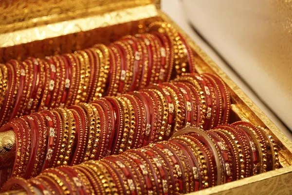 Red_Gold_Embellished_Bridal_Bangle_Set_In_Golden_Storage_Box