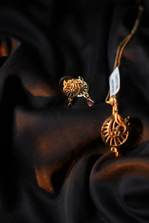 Gold_Peacock_Motif_Pendant_Earrings_With_Ruby_Accents