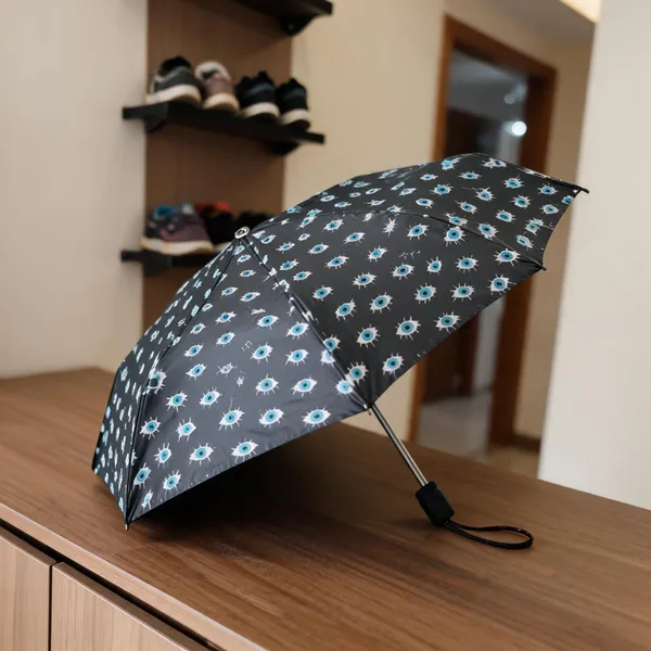 Black_Polyester_Eye_Print_Foldable_Umbrella_For_Adults
