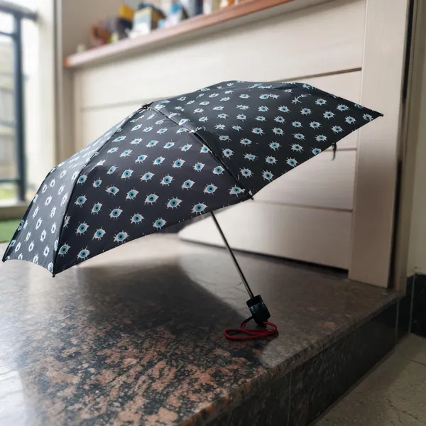 Black_Polyester_Eye_Print_Foldable_Umbrella_For_Adults
