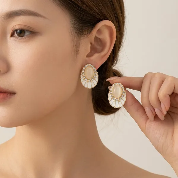 Gold_And_White_Stone_Studded_Oval_Stud_Earrings_For_Women