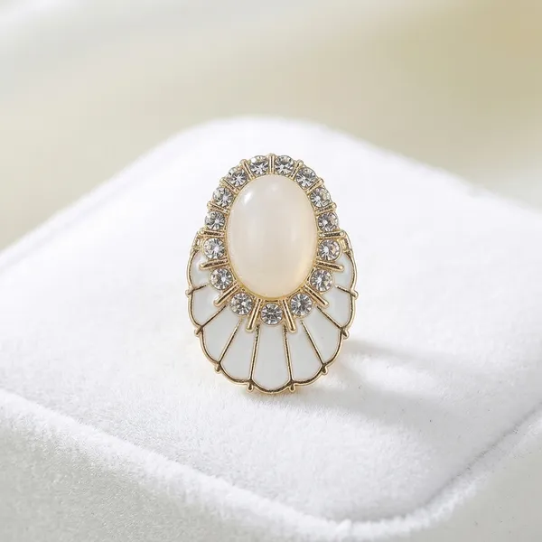 Gold_And_White_Stone_Studded_Oval_Stud_Earrings_For_Women