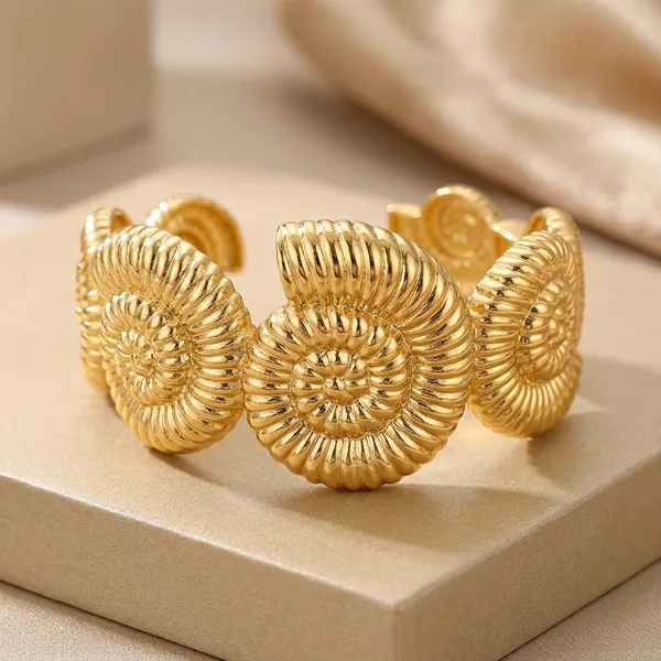 Gold_Toned_Spiral_Shell_Design_Statement_Bracelet_For_Women