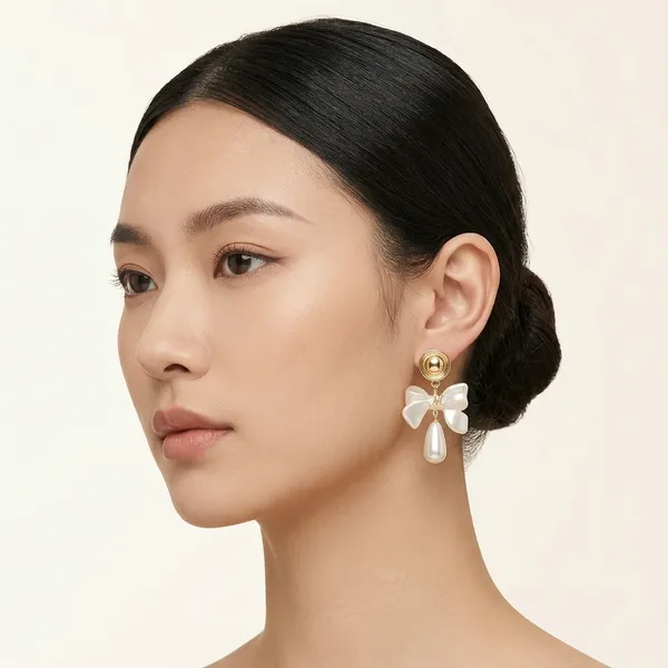 Gold_Toned_Pearl_Bow_Drop_Earrings_For_Women