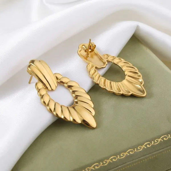 Gold_Toned_Twisted_Teardrop_Statement_Earrings_For_Women