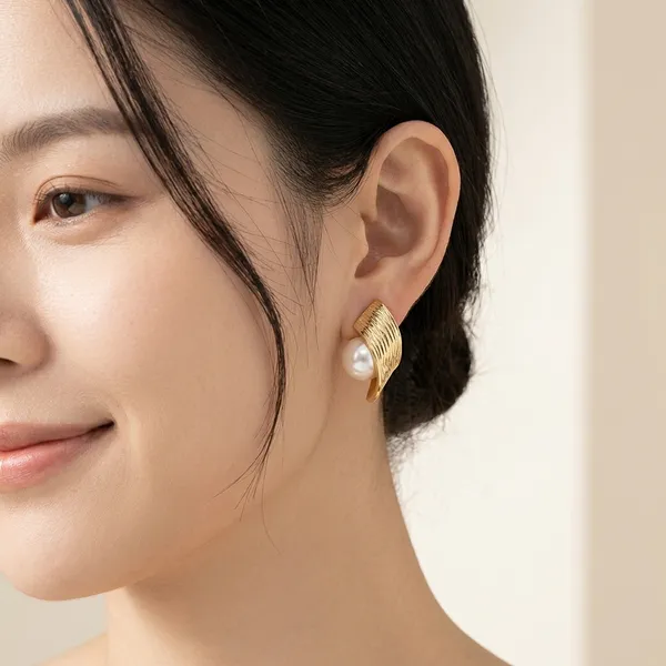 Gold_Toned_Wing_Design_Pearl_Stud_Earrings_For_Women